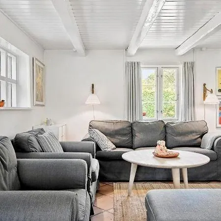 Reetdach-ferienhaus-mit-traumhaftem-panoramameerblick Vakantiehuis *