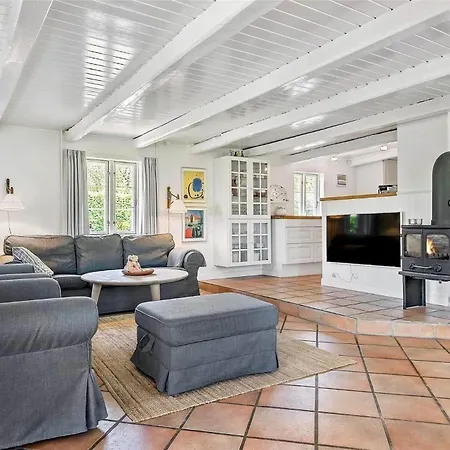 Reetdach-ferienhaus-mit-traumhaftem-panoramameerblick Vakantiehuis