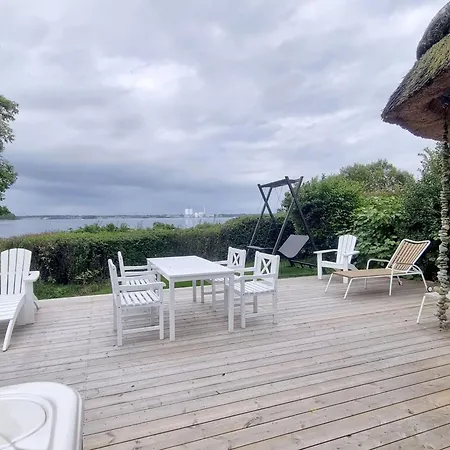 Vakantiehuis Reetdach-ferienhaus-mit-traumhaftem-panoramameerblick